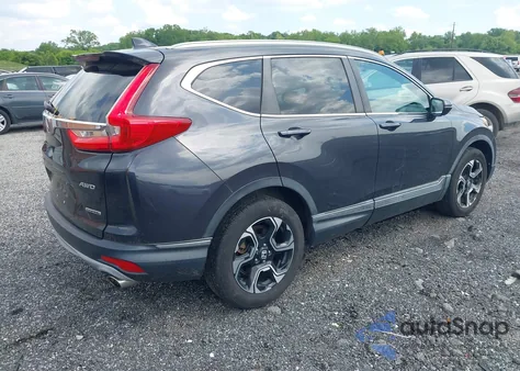 2017 Honda Cr-V Touring z USA, uszkodzony, nr VIN 2HKRW2H99HH615018